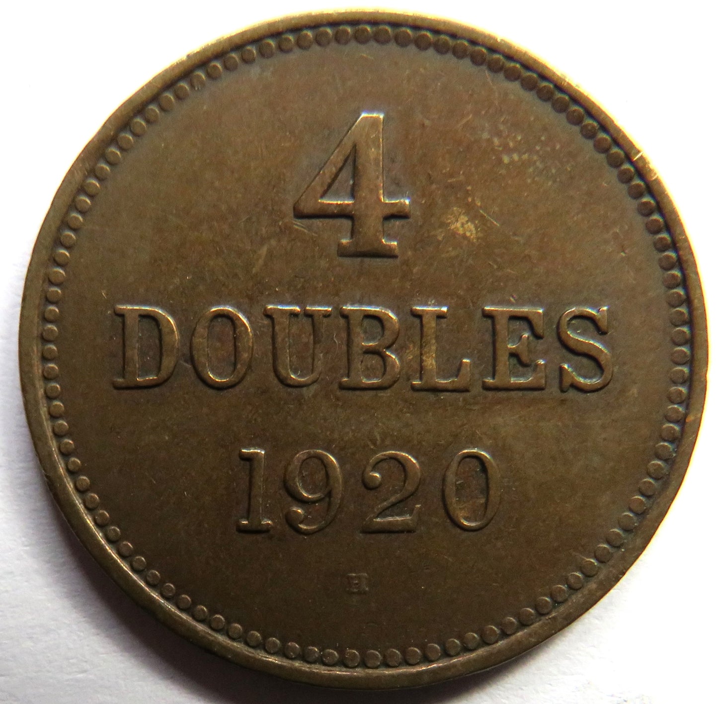 1920-H Guernsey 4 Doubles Coin