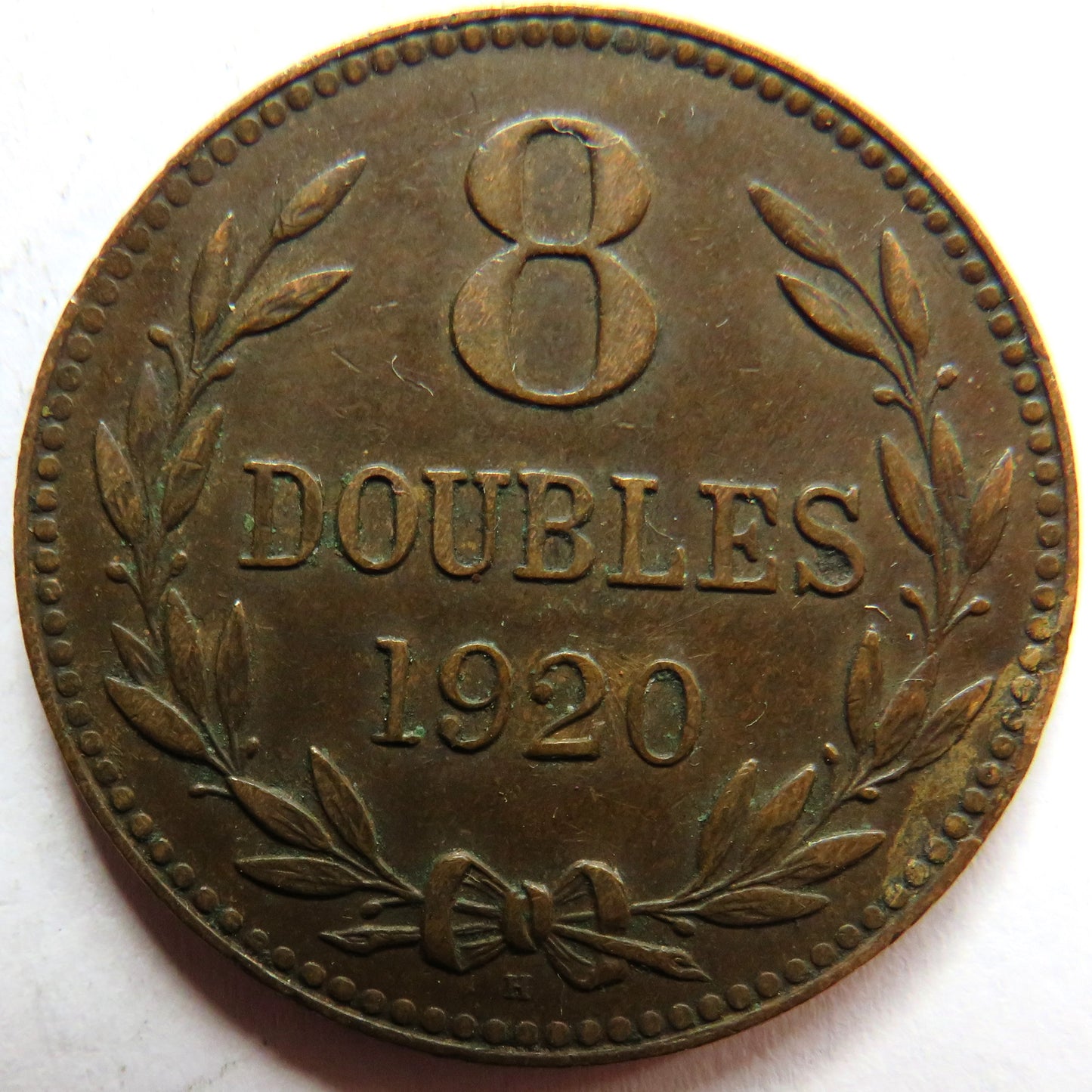 1920-H Guernsey 8 Doubles Coin