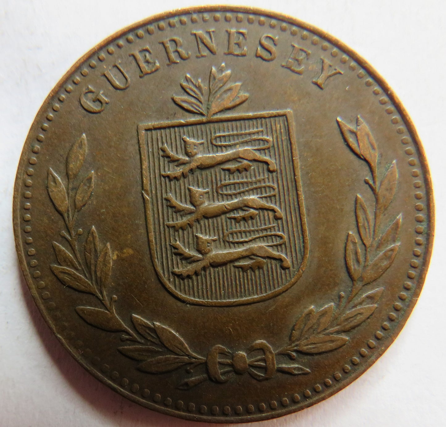 1920-H Guernsey 8 Doubles Coin