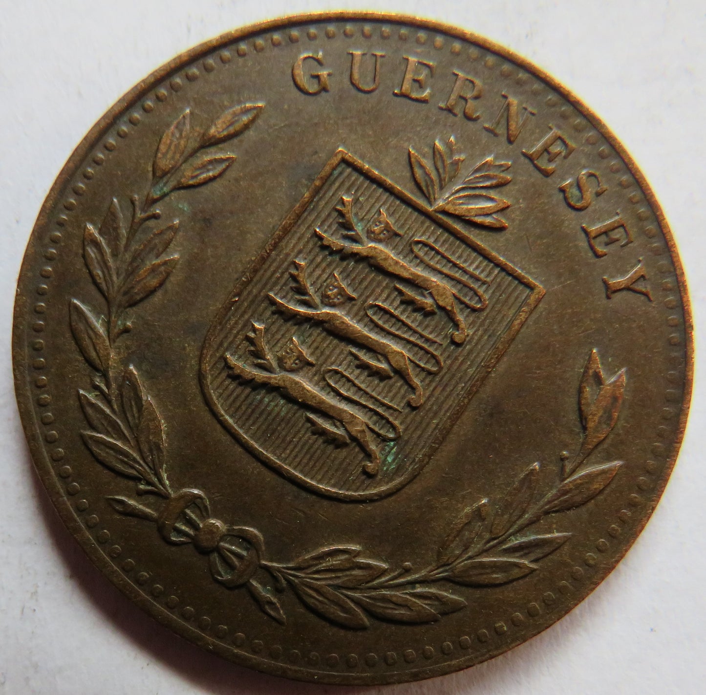 1918-H Guernsey 8 Doubles Coin