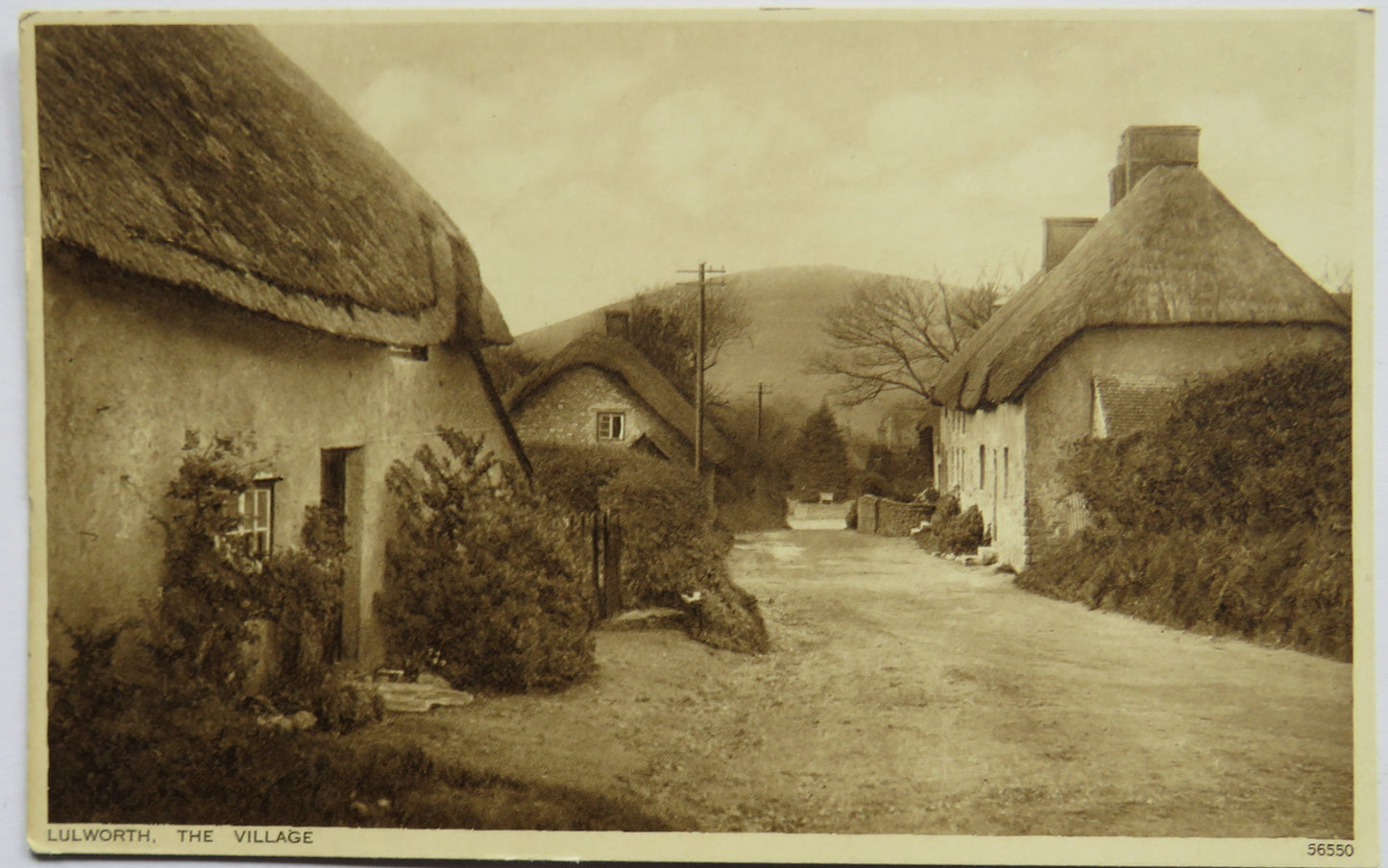 Vintage Postcard of Lulworth, The Village