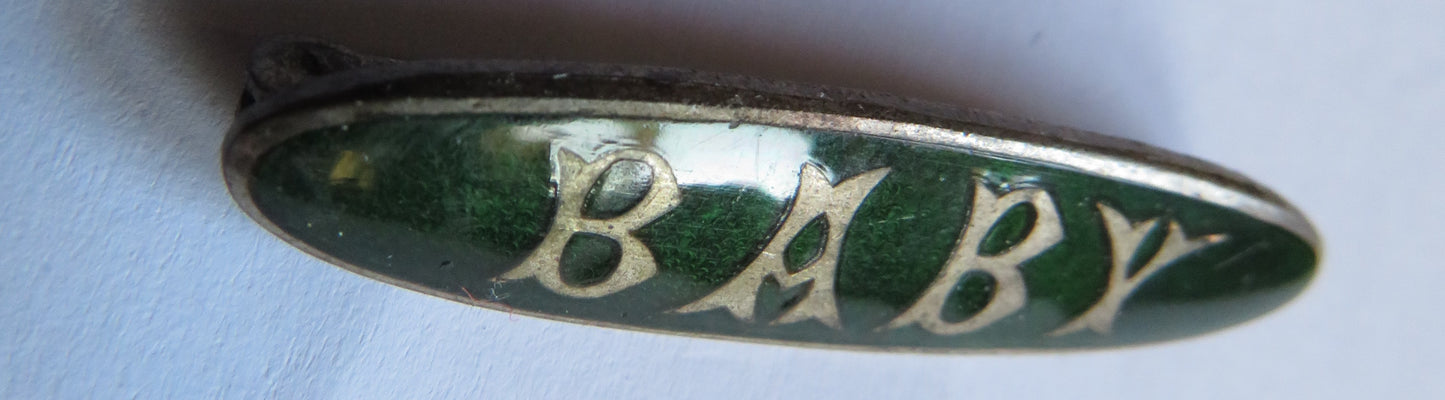 Antique White Metal & Enamel "Baby" Brooch
