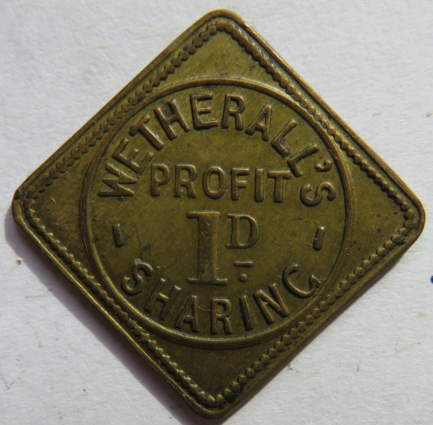Wetherall's Profit 1d Sharing Vintage Token