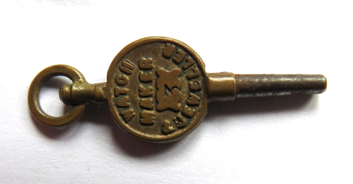 Antique Advertising Pocket Watch Key "WM Kent Stains and Sunbury