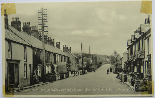 Vintage Postcard of The Village Llanfairpwllgwyngyllgogerychwyrndrobwllllan-llantysiliogogogoch