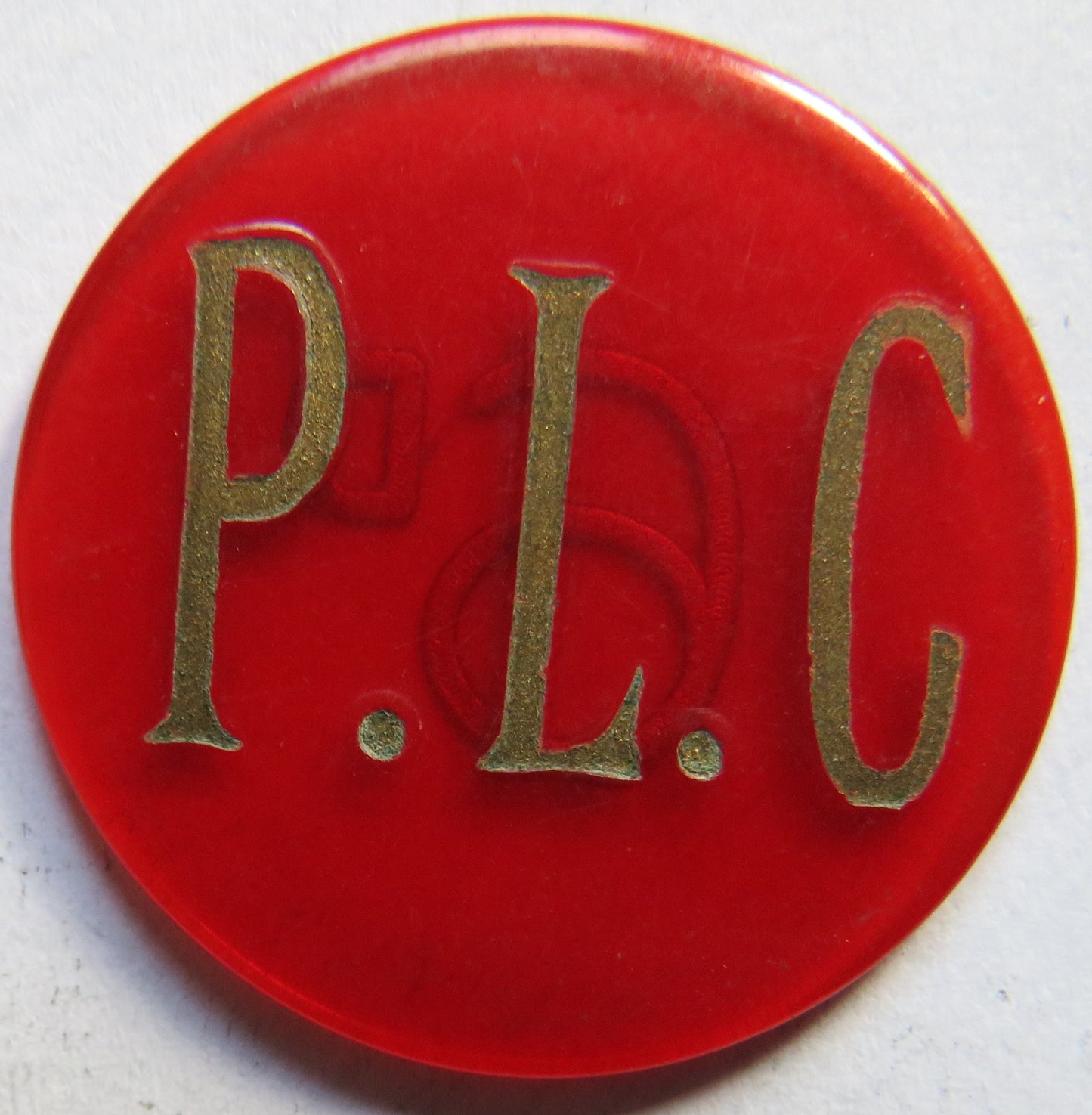 P.L.C. 6d Vintage Plastic Token