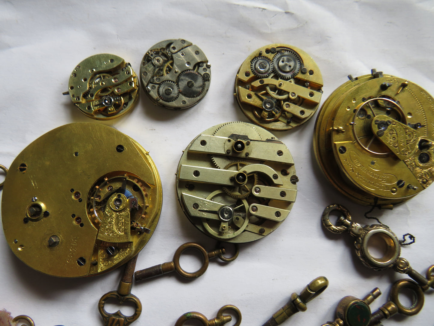 Small Collection of Antique Pocket Watch Parts & Keys