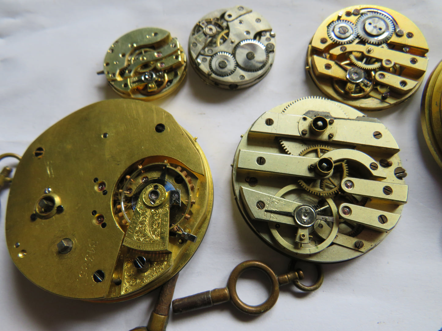 Small Collection of Antique Pocket Watch Parts & Keys