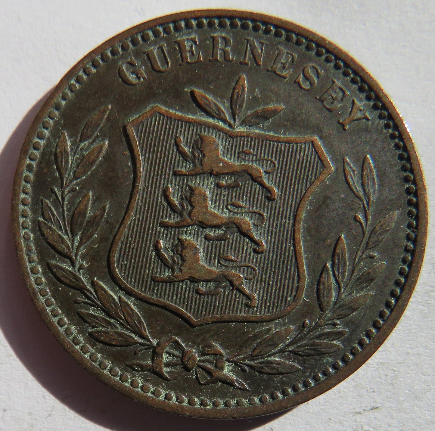 1889-H Guernsey 8 Doubles Coin