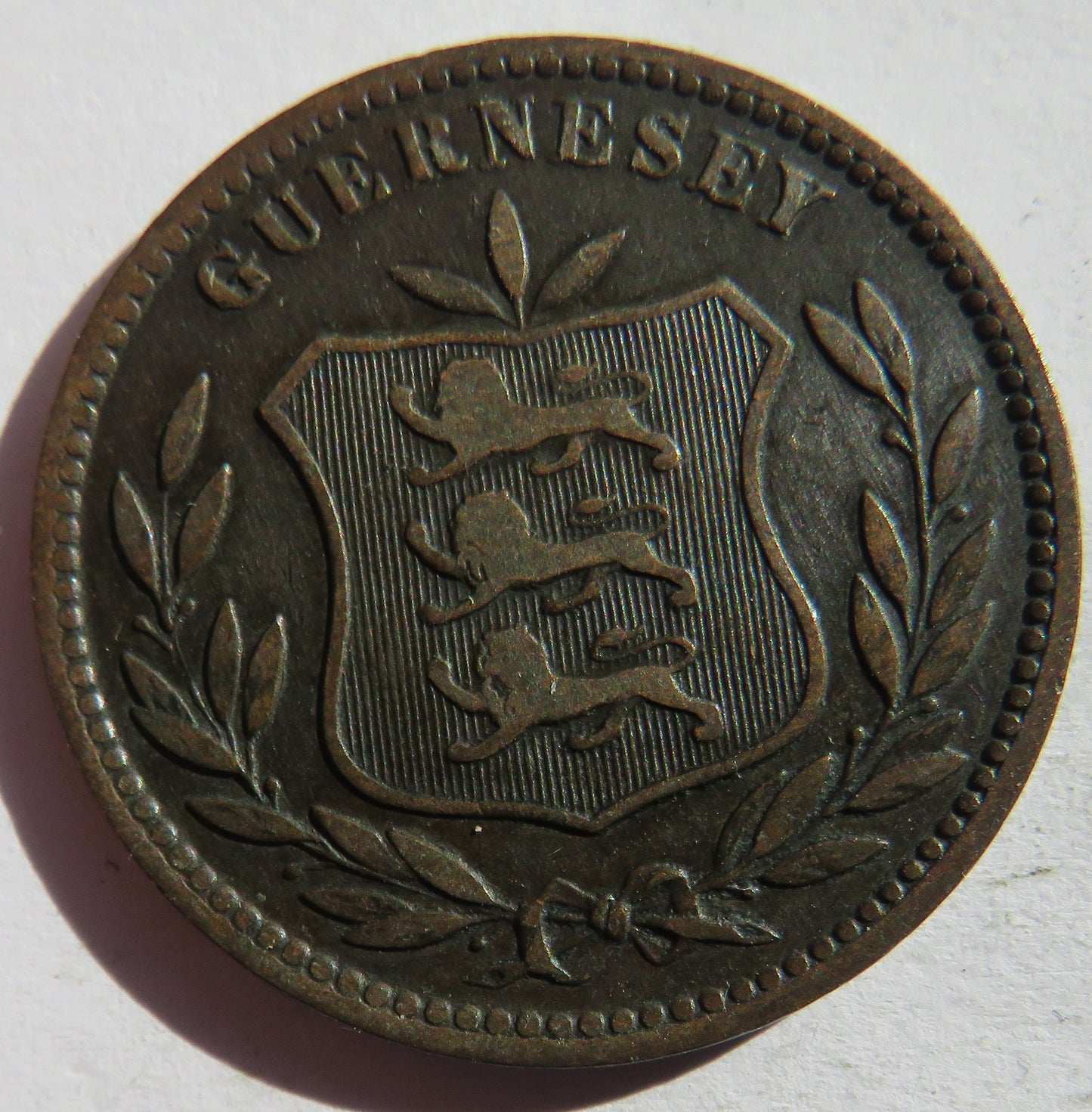 1902-H Guernsey 8 Doubles Coin