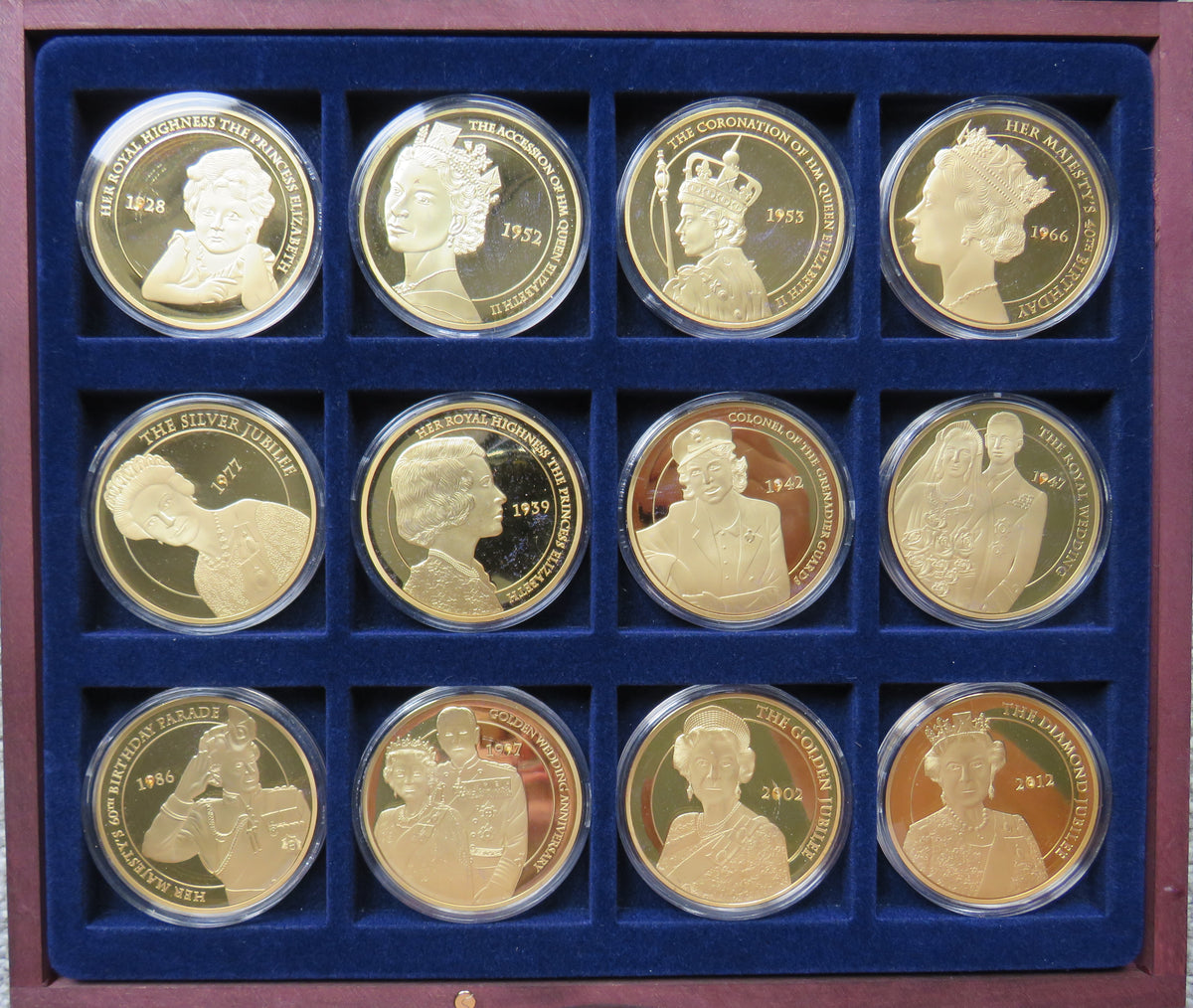 Portraits of Queen Elizabeth Cased 12 Coin / Medal Set 50mm Diameter
