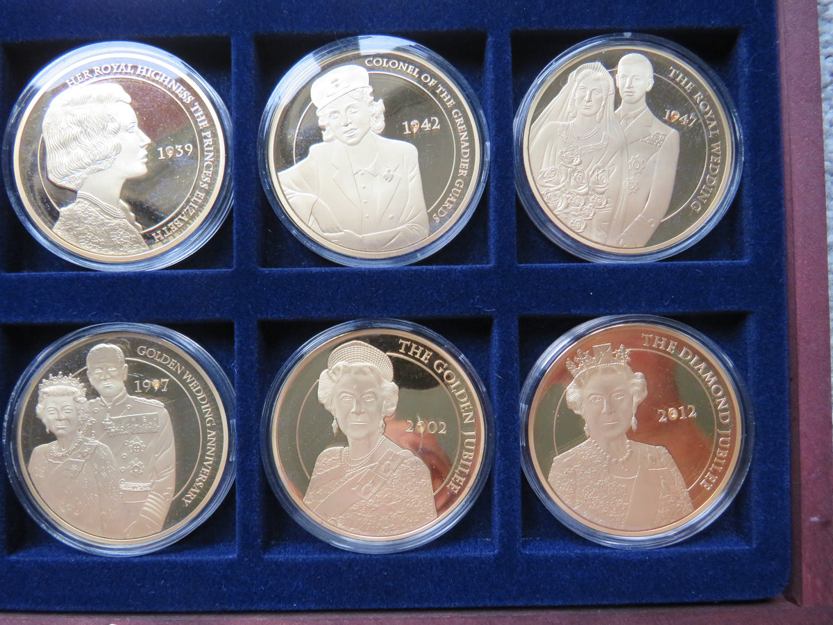 Portraits of Queen Elizabeth Cased 12 Coin / Medal Set 50mm Diameter