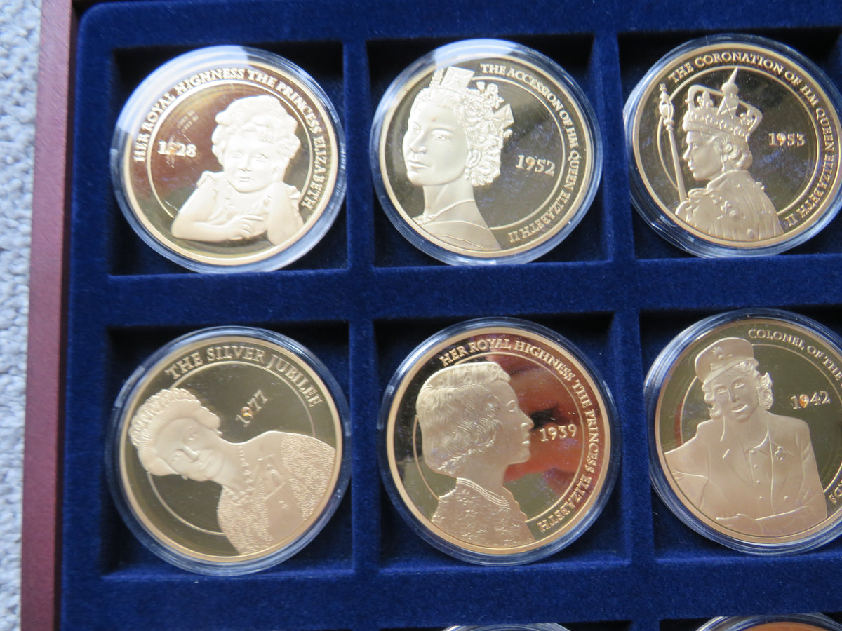 Portraits of Queen Elizabeth Cased 12 Coin / Medal Set 50mm Diameter