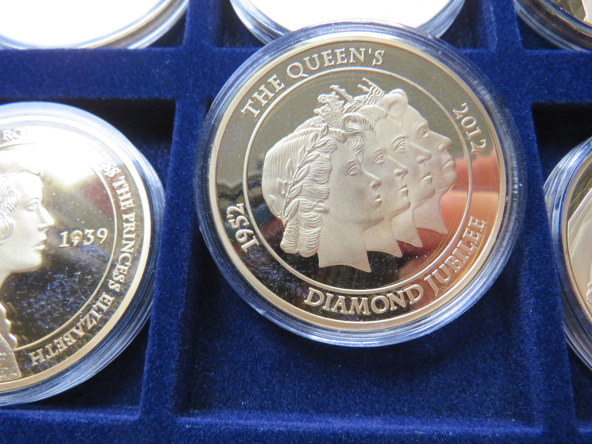 Portraits of Queen Elizabeth Cased 12 Coin / Medal Set 50mm Diameter