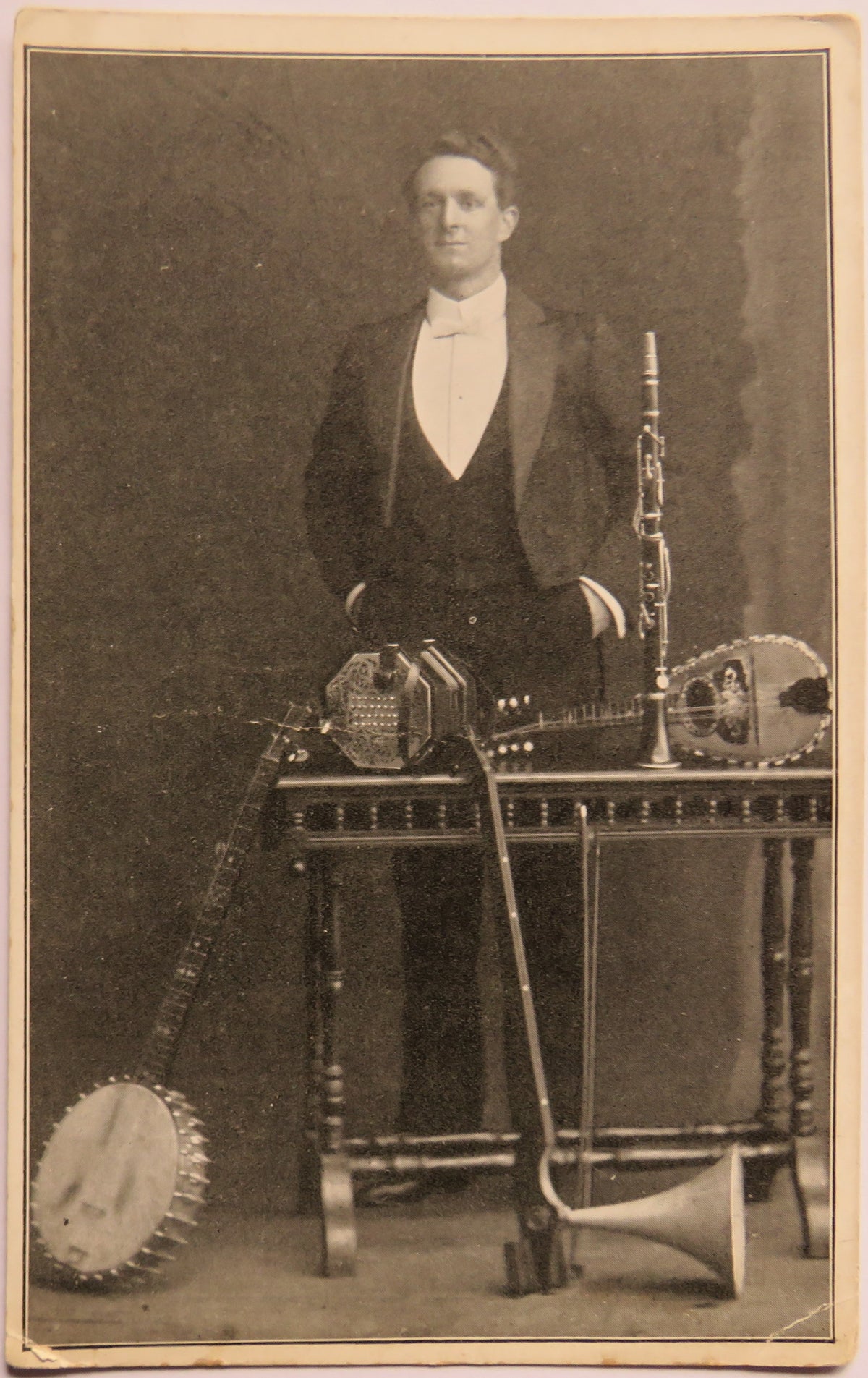Vintage Postcard of Musician and Instruments, 1921