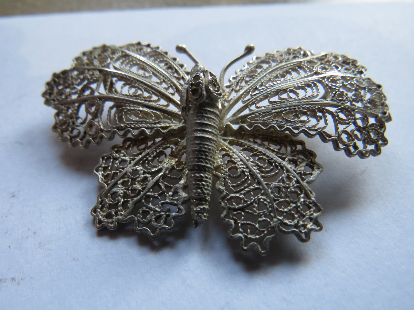 Vintage Ladies White Metal Filigree Butterfly Brooch