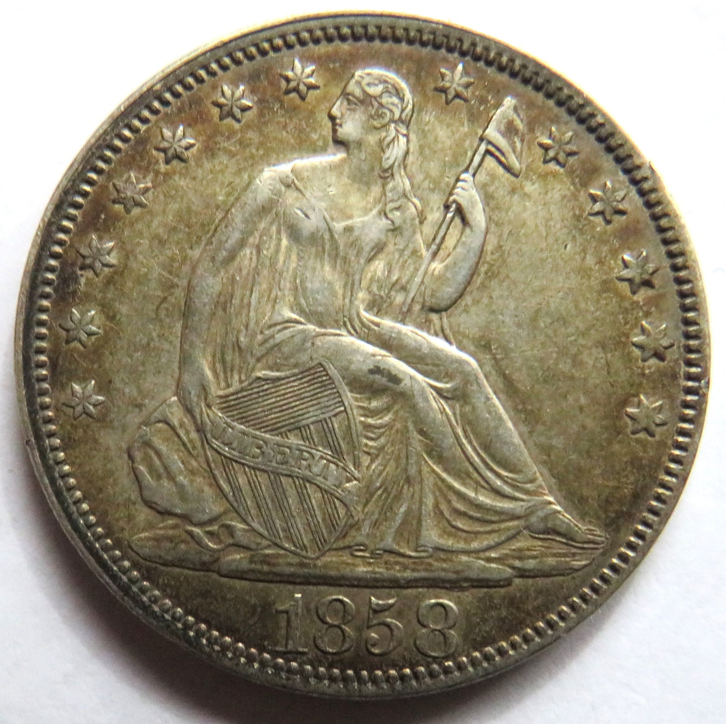 1858 USA Seated Liberty Silver $1/2 Half-Dollar Coin In High Grade