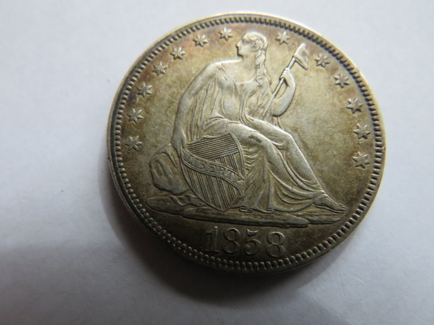 1858 USA Seated Liberty Silver $1/2 Half-Dollar Coin In High Grade