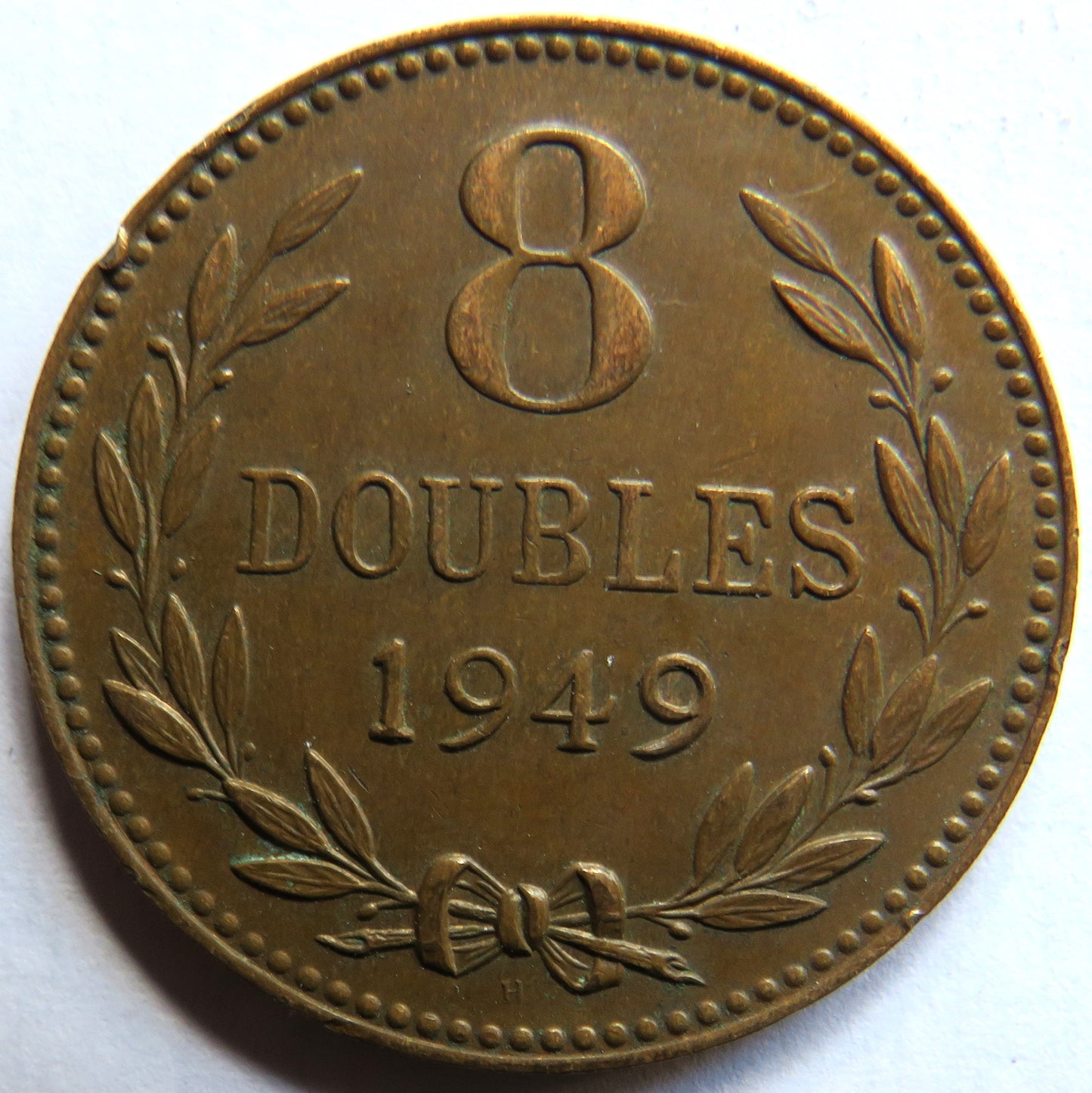1949 Guernsey 8 Doubles Coin