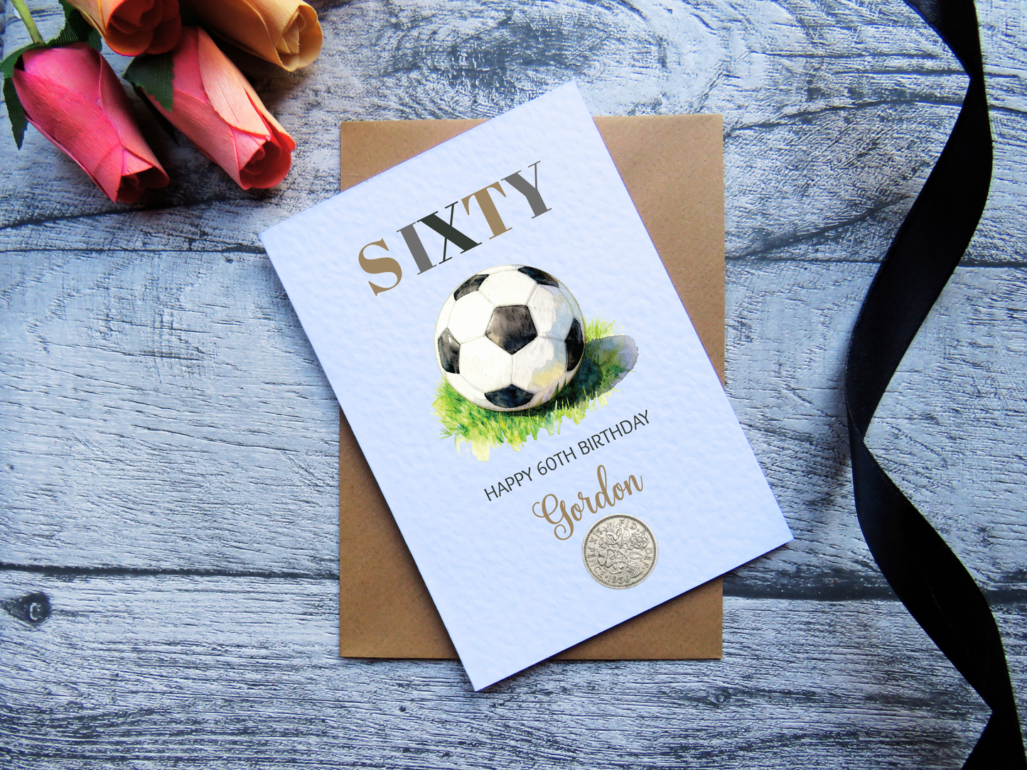 Football 60th Birthday Card with Real 1966 Coin on wooden surface with black ribbon