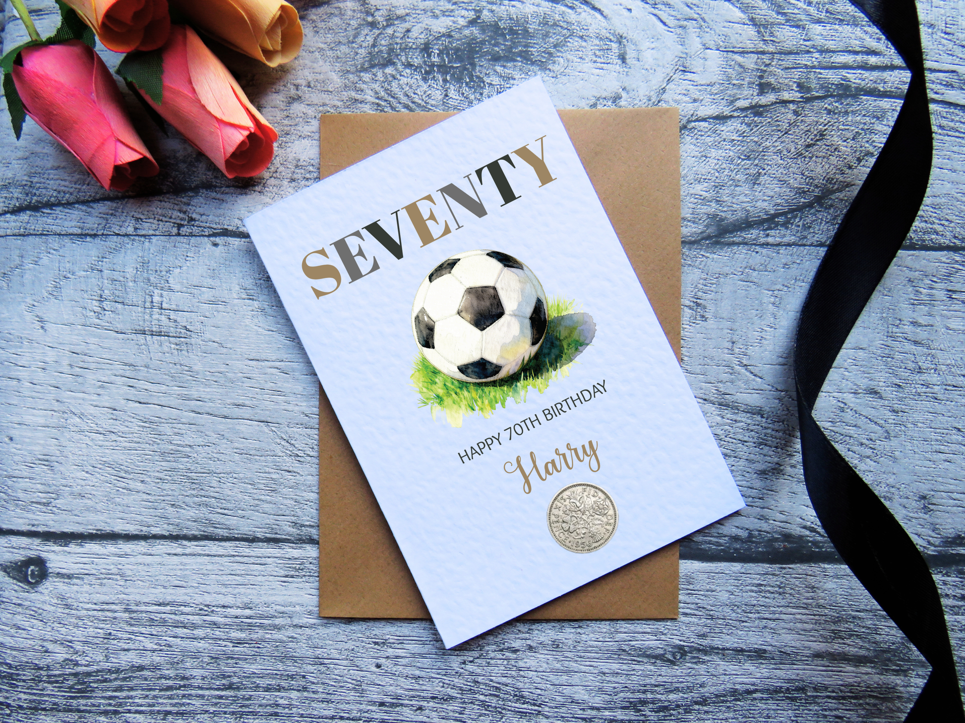 Football 70th Birthday Card with Real 1956 Coin on wooden surface with black ribbon